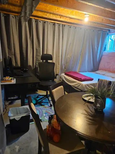 The space comes with a dresser, desk and chair, table and chairs. Surounded by curtains to make it p...