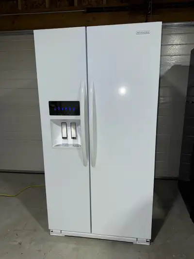 Kitchen Aid fridge for sale. 36inch width and 68inch height. Perfectly working and cooling ✅ Deliver...
