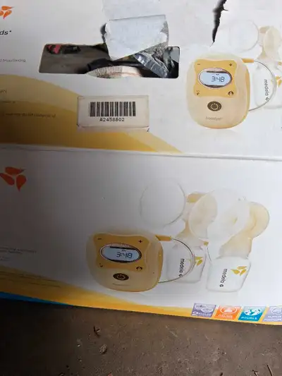 Double pump Can be hands free, Comes with bottles, bags, pain relief gel pads, and assortment of att...