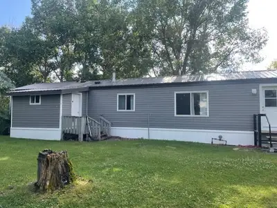 This mobile home must be moved from it's current location just outside of Bow Island (at the buyer's...