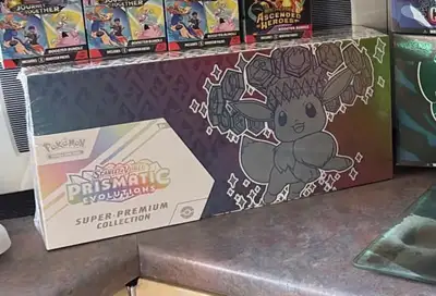 Pokemon Prismatic Evolutions Super-Premium Collection, View more