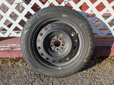4 mounted and balanced studded winter tires with very little wear. Rims fit toyota Corolla, other To...