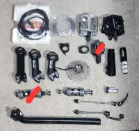 Misc bike parts new/used, stems, pedels, seat, bar, bb, and more