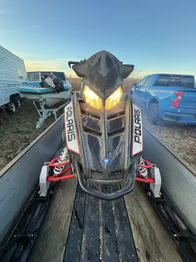 In Excellent condition a 2012 Polaris RMK Pro 800 with Only 2354 miles. Has a 155 track/ 2.4 inch lu...