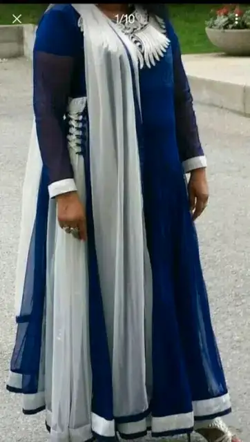EXCELLENT CONDITION. WORN ONLY ONCE FOR FEW HOURS. Dark blue with white combination. Has churidar, d...