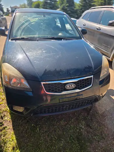 2011 Kia Rio5, Manual Transmission. Located Grenfell. Only 154,xxx km(majority of this is hwy, as it...