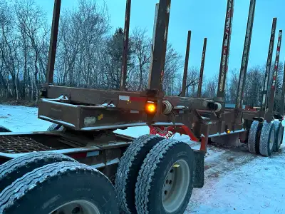 1995 Doepker super b log trailer. Lead trailer specs: 1995 Axle width 8’6” Bunk width 8’6” Air ride,...