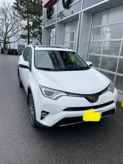 I'm selling a white 2018 Toyota Rav4 XLE with 203,000 kilometers,my wife’s car This SUV offers relia...