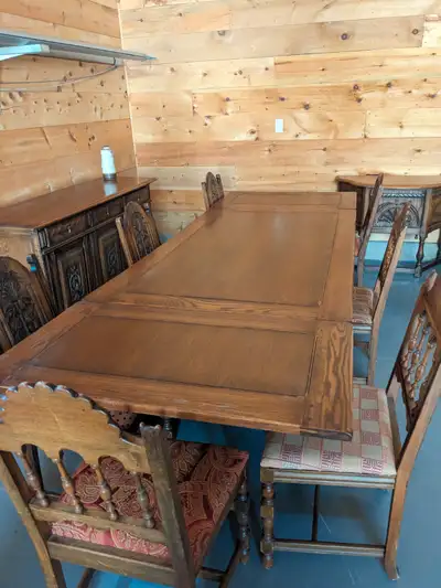 Solid oak carved dining room set with two side boards and 8 chairs - fully extended it is 120 inches...
