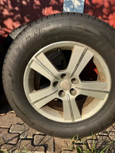 Up for sale is a set of Subaru rims and Fuzion Touring tires. 235/60 R16 100h These used tires are i...