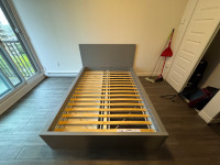 IKEA Malm full size bed frame with two storage boxes