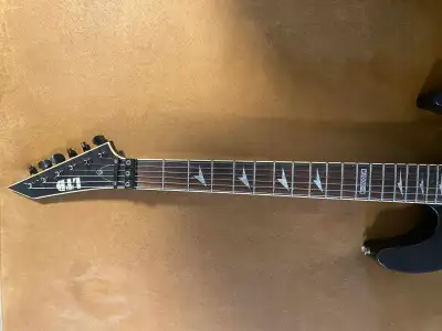 Selling my LTD neck through reverse head. Low action Floydrose with tremolo EMG pickups Very good co...