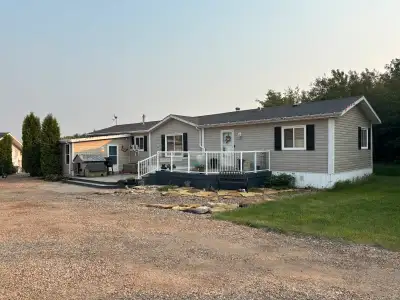 2008 Moduline Silverwood Orlando 20 x 76’ modular home with heated addition and two tier deck - TO B...