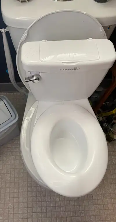 Hardly used toddler toilet with flushing sound (bleached clean )asking $15