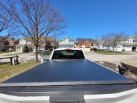 Tonneau Cover 6.5' in good shape.