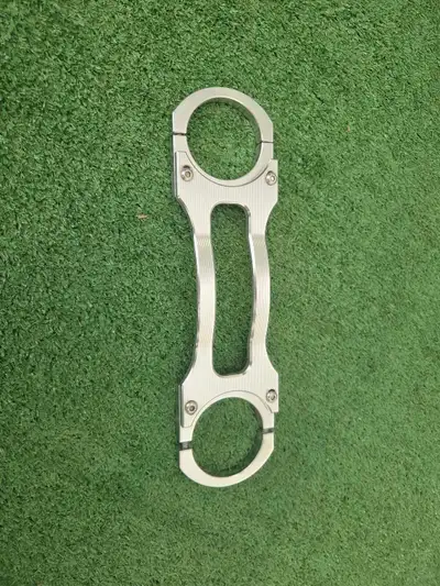 Upgrade your ride with this sturdy, pre-owned machined aluminum fork brace designed to enhance your...
