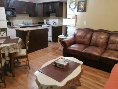 2 Bedroom suite, grand floor with full bathroom, living room, kitchen furnished and ready to move
