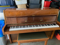 Piano priced  to sell quickly
