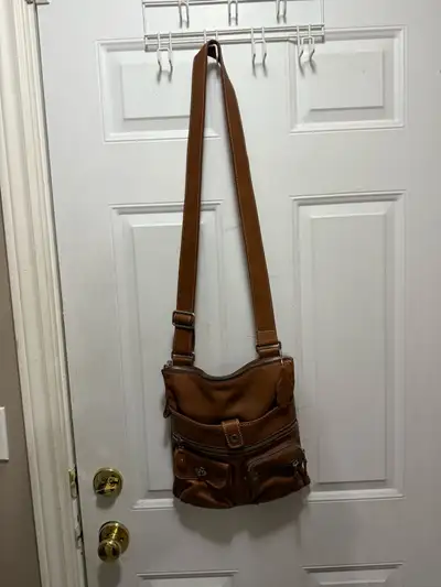 Gorgeous Leather Roots Purse and Franco Sarto boots, View more