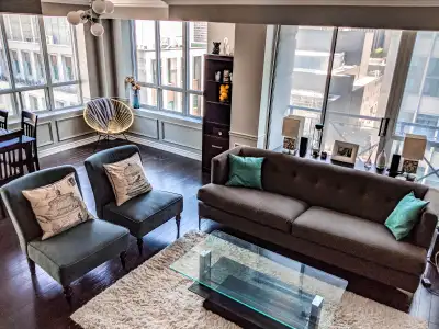 Available: July 1st An exceptionally large 2-bedroom + den corner suite at 140 Simcoe (SW corner of...