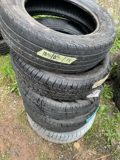 I'm selling a set of four used tires, size 185/65/15, perfect for a compact car. These tires are in...
