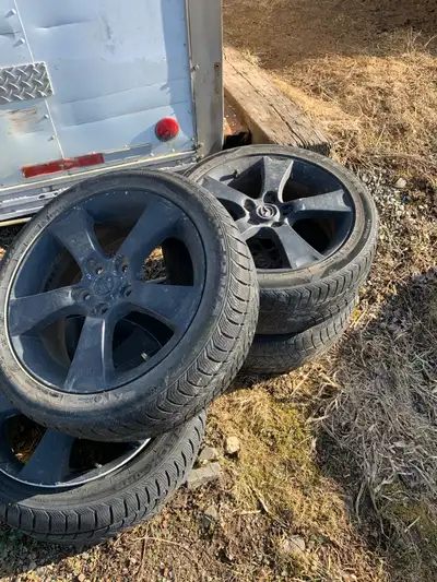Four rims three of the tires are still good