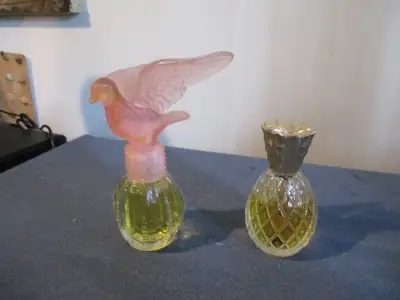 In my collection many years, these 2 bottles are in good condition. Bottles are Avon & I believe the...