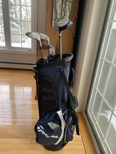 Golf clubs and bag (left) , View more