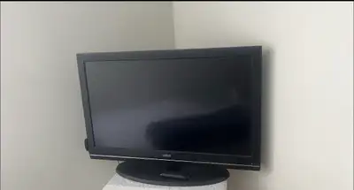 RCA 37” Flat Screen TV + Roku Streaming Device , View more