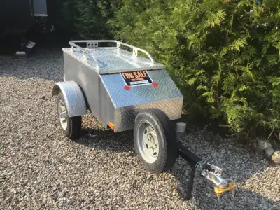 Lightweight aluminum cargo trailer. Used only a few times between Alberta and Balfour. Very good con...
