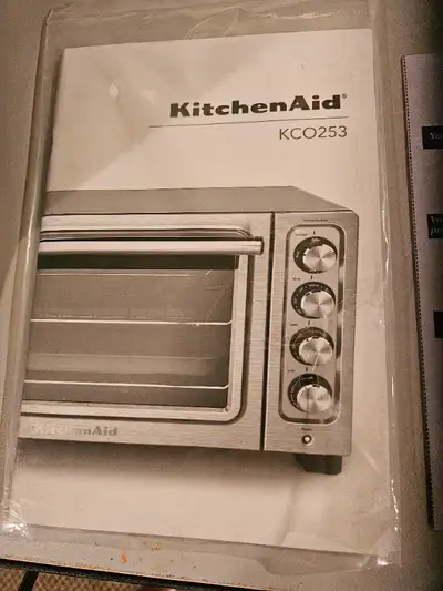 Counter top Kitchen Aid compact oven. Never used. Comes with all instructions. This compact oven has...