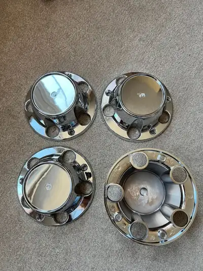 4 Pcs Chrome Wheel Center Caps (8cm H x 18cm W). Sorry, I have no idea which vehicle this is for.