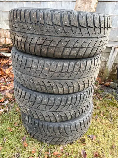 4 studded winter tires on rims - were on VW Golf - good for one more winter - pick up in Mill Villag...