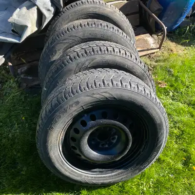 I have 4 Toyo Observe GSi-5 winter tires on black winter rims. 5x114 bolt pattern, studless, severe...