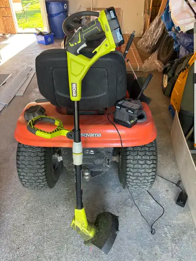 Ryobi battery weed trimmer with charger and extra battery