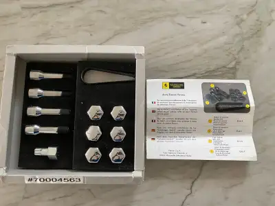 Ferrari Wheel Lock Kit. Brand new and never used. Fits: Ferrari 355, 360, F430, 458, 599, California...