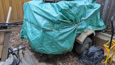 Homemade trailer left in disrepair Needs a new home Tilts Comes with original metal bed (stored sepa...