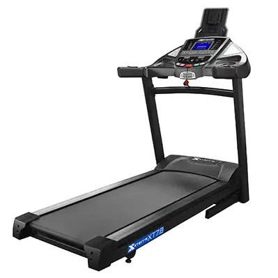 SLIGHTLY USED XTERRA TREADMILL........3.5hp MOTOR,20x60 RUNNING SURFACE,12 POWER INCLINES.38PROGRAM...