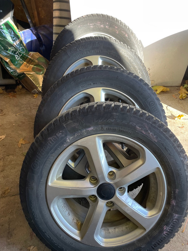 4 winter tires on alloy rims 195/65R15 in Tires & Rims in Kingston
