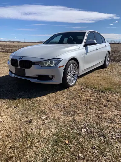 2013 bmw 335i x drive luxury model with 179000km on it. Great shap, runs and drives good. Pearl whit...