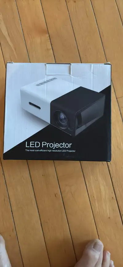 Mini LED projector/ easy to hook up and use. Viewing and pick up in southwest Edmonton. 75 obo