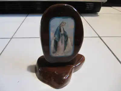 Up for sale is a vintage handmade lacquered finish wood mounted Madonna Icon. Part of an estate sale...