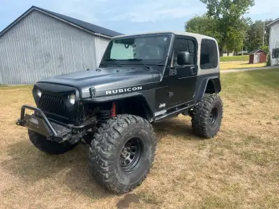 Got a sweet 03 Jeep rubicon 4.0l automatic with 210km. Runs great ! Lockers front an back working gr...