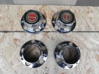 I have a few sets of center caps for for 4x4 and 2WD OEM factory metal caps These are original equip...