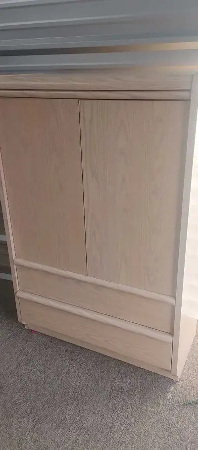 This dresser cabinet offers a blend of functionality and style, perfect for organizing your space. B...
