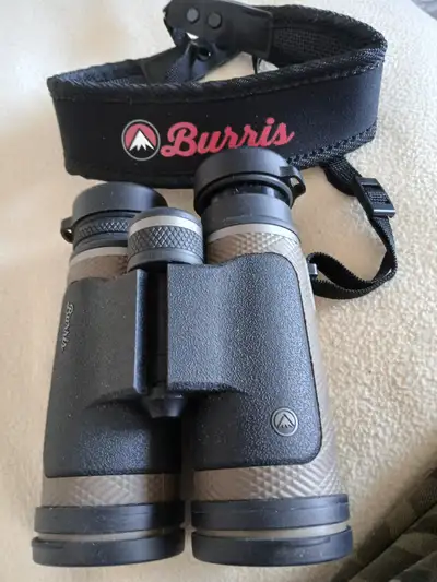 BURRIS BInoculars for sale. 8 x 42. Excellent condition. Comes with a case too. Asking $295.00.