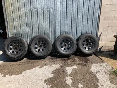 I am offering a set of 4 Bridgestone Blizzak tires mounted on GM steel rims. They are good used cond...