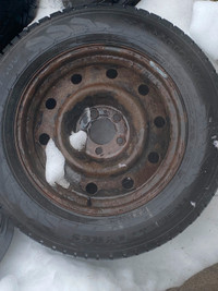 4 Winter tires on rims 225 65 R17 $250 (506)-447-2813