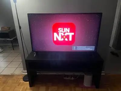 LG 55” 4K UHD Smart TV + TV Stand, View more