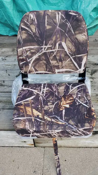 Wise mid back boat seat. New . real tree camo 75.00. Retail 117.00 Pickup in Markham.